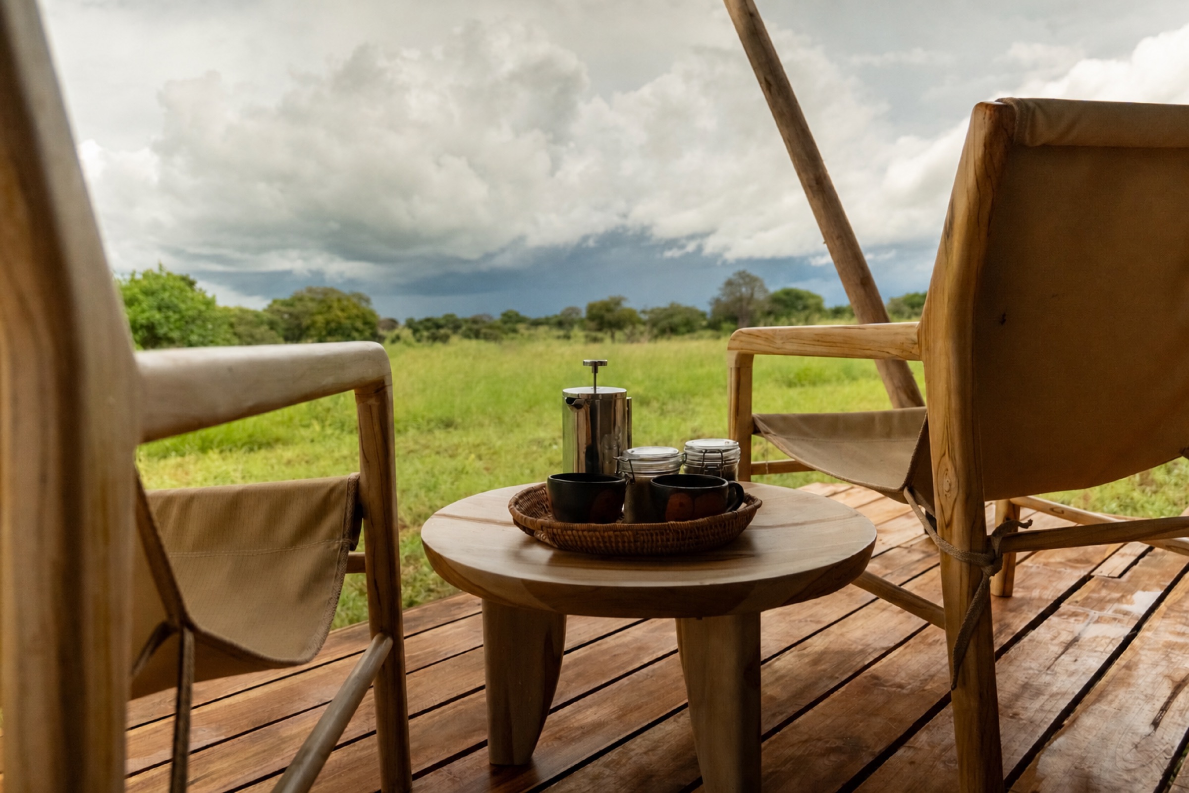 Morning coffee on private deck overlooking Tarangire plains at Conserve Safari